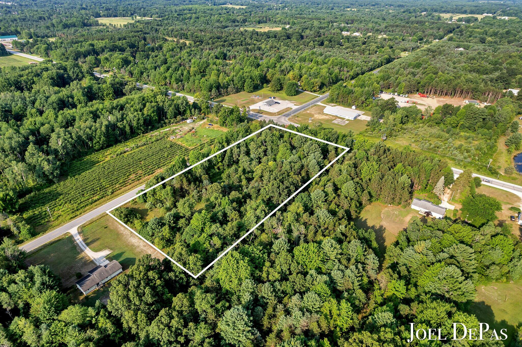 4650 Holton Road Twin Lake, MI 49457 - Photo 2 of 14 02-DJI_0261-Edit