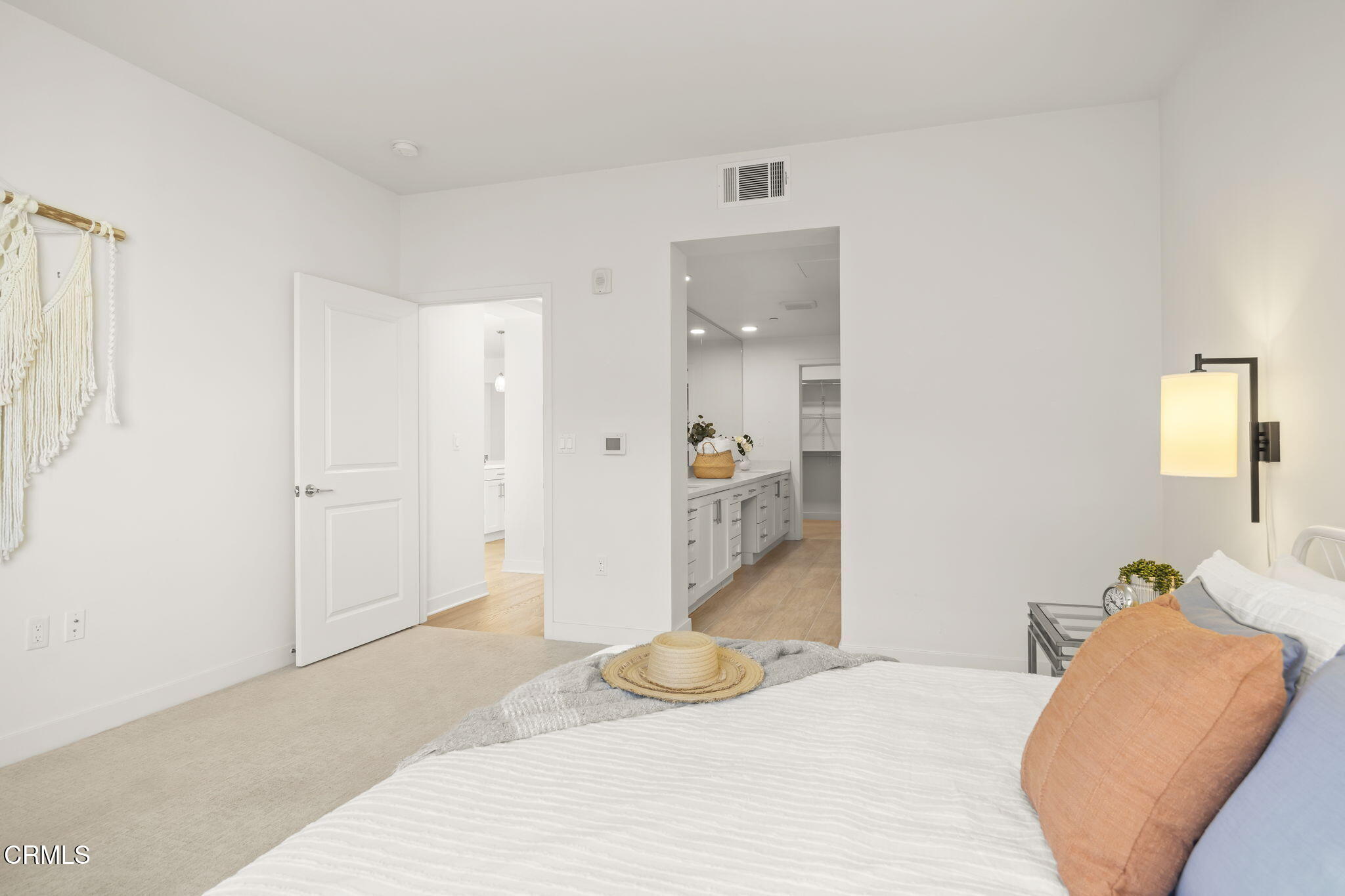 2800 Wagon Wheel Road, Unit 404 Oxnard, CA 93036 - Photo 26 of 43 a bedroom with a bed and a couch