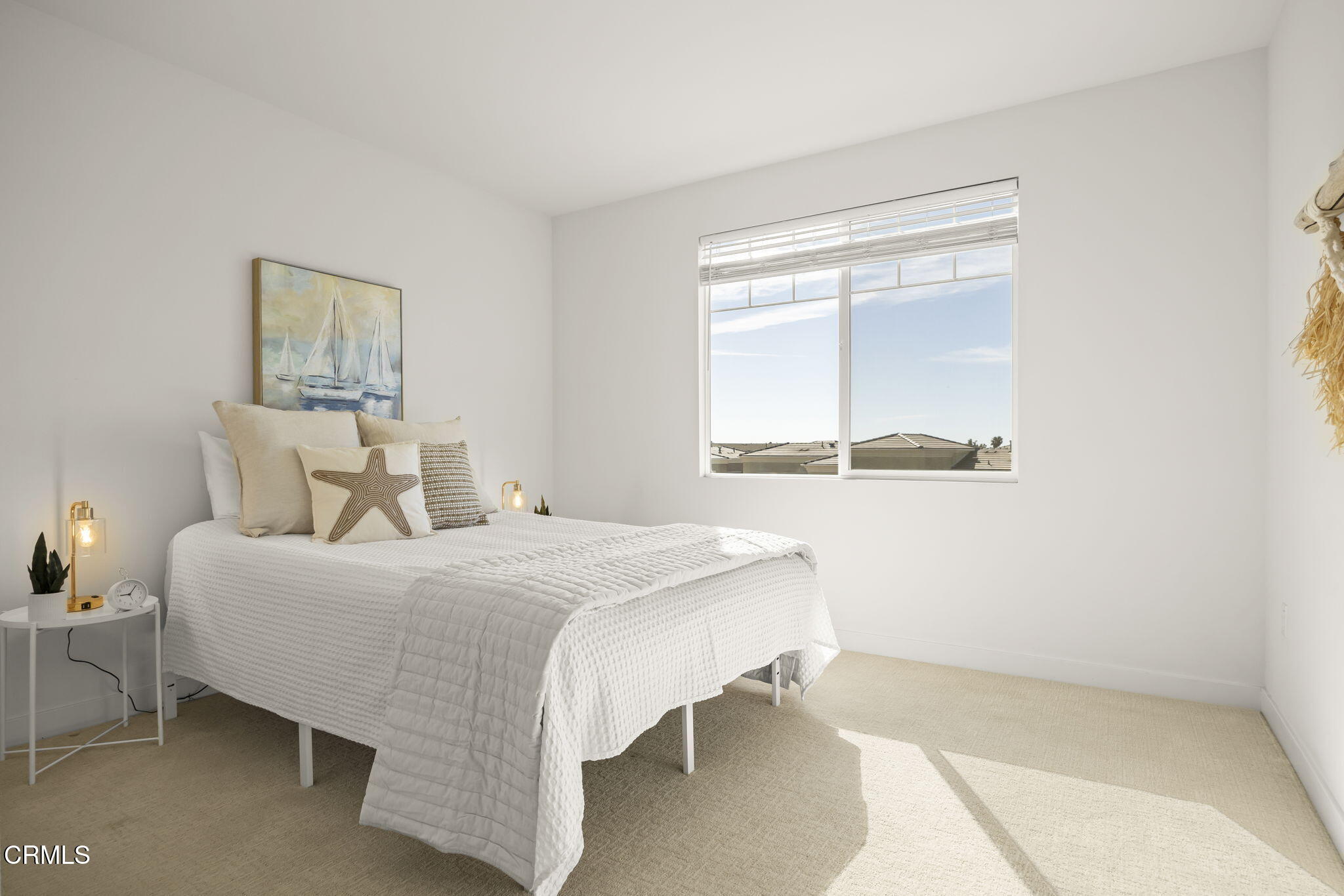 2800 Wagon Wheel Road, Unit 404 Oxnard, CA 93036 - Photo 31 of 43 a bedroom with a bed and window