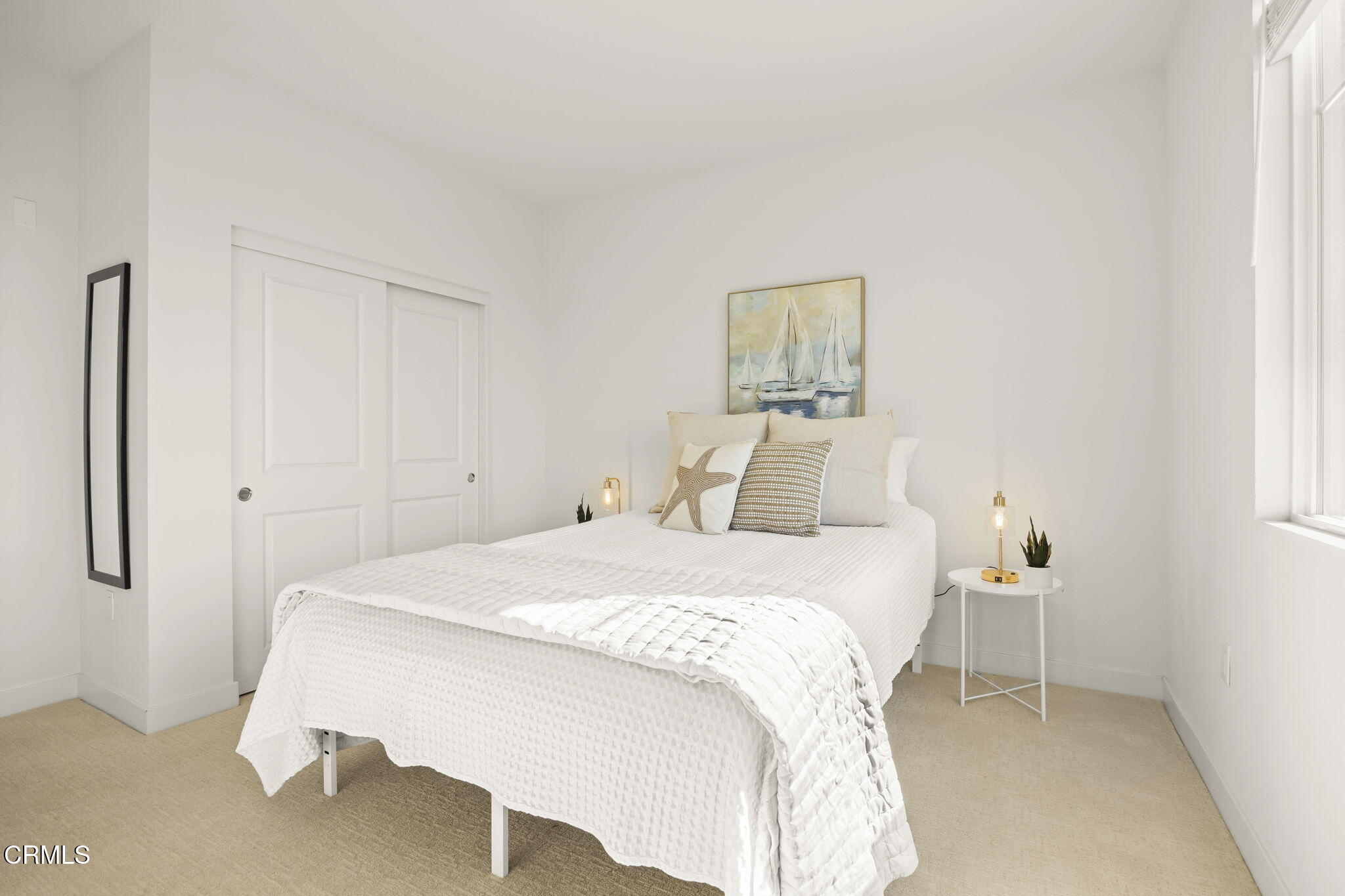 2800 Wagon Wheel Road, Unit 404 Oxnard, CA 93036 - Photo 32 of 43 a bedroom with a bed and a window
