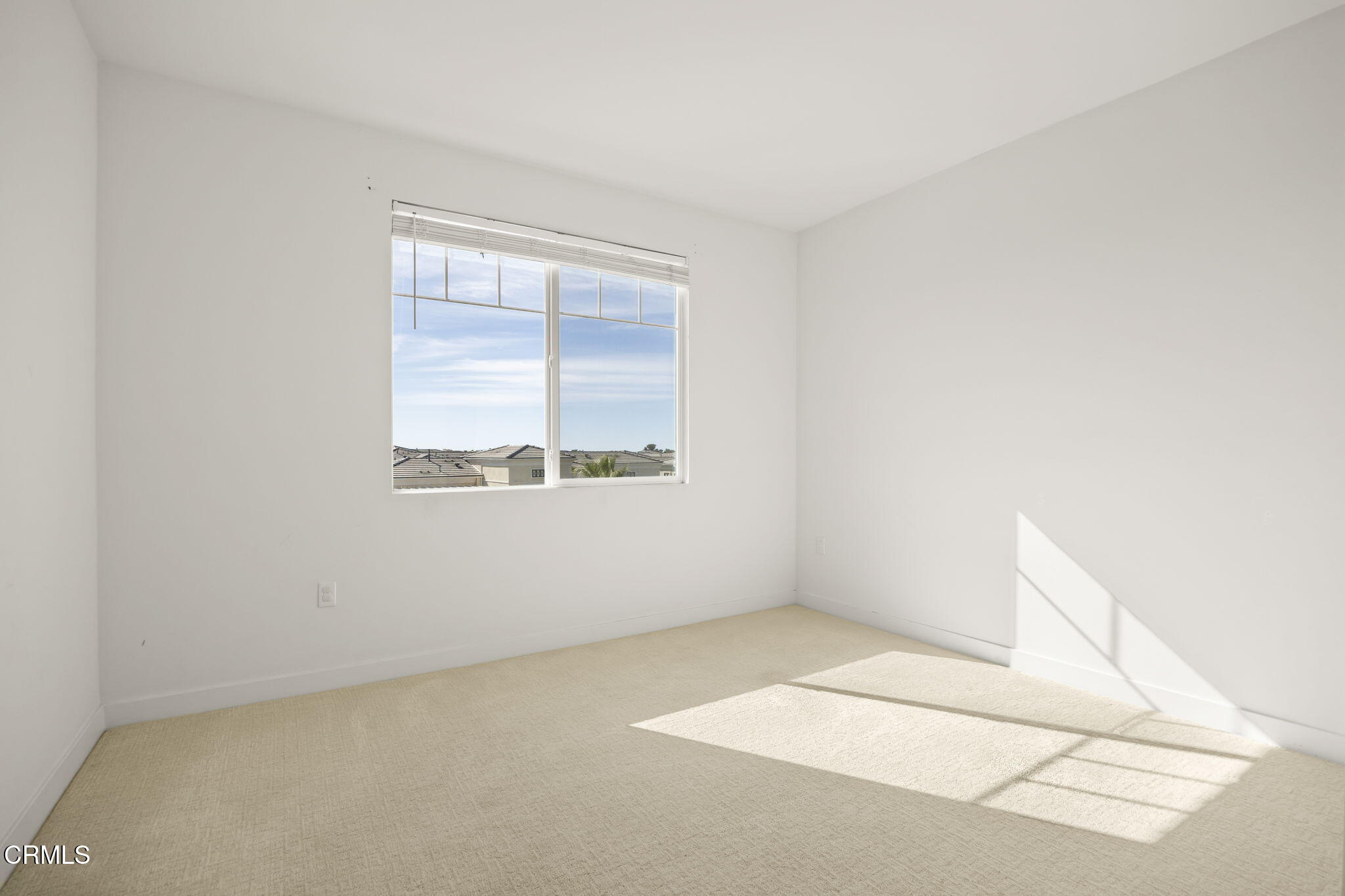 2800 Wagon Wheel Road, Unit 404 Oxnard, CA 93036 - Photo 33 of 43 an empty room with a window