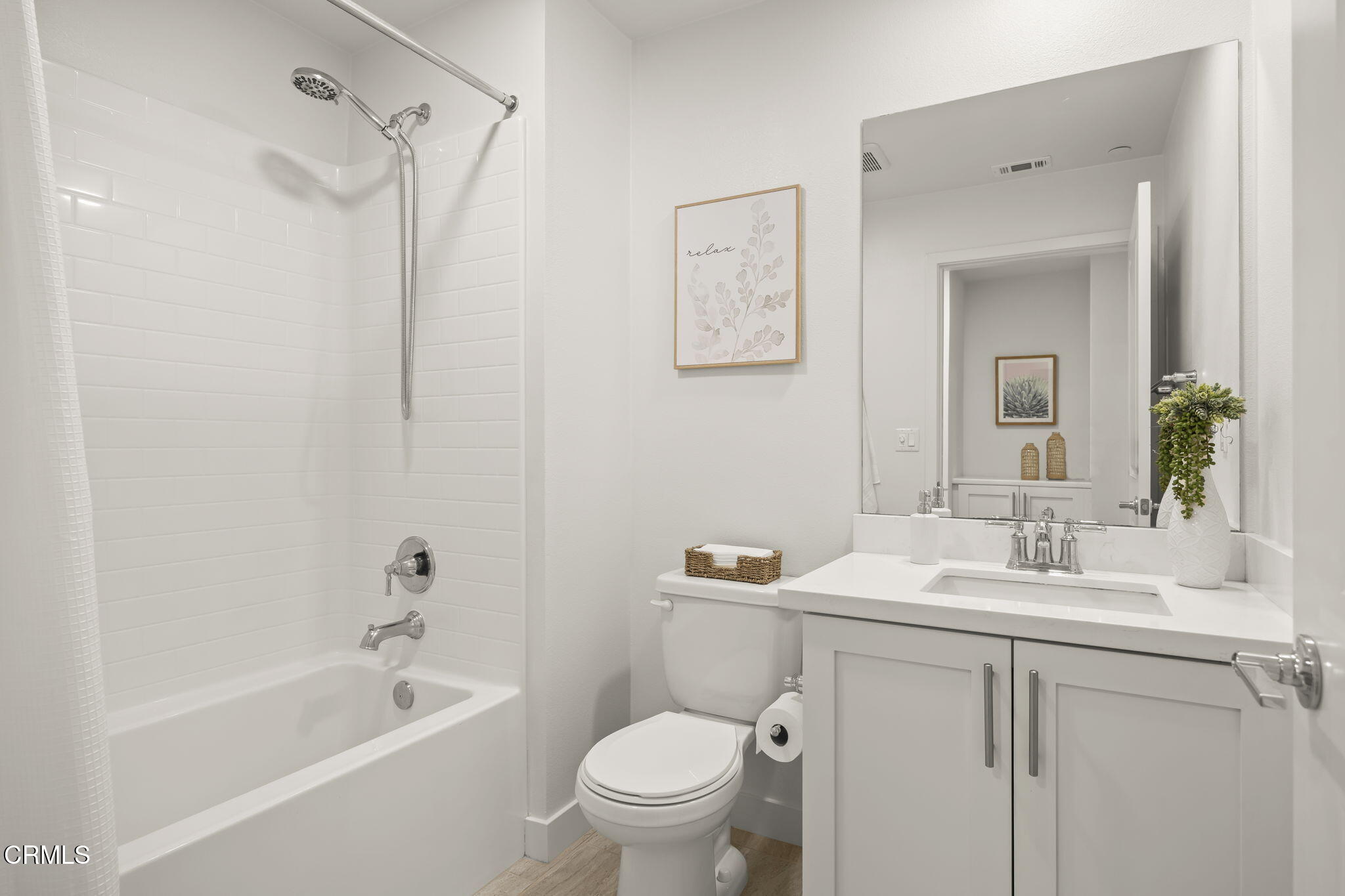 2800 Wagon Wheel Road, Unit 404 Oxnard, CA 93036 - Photo 34 of 43 a bathroom with a sink a toilet and shower