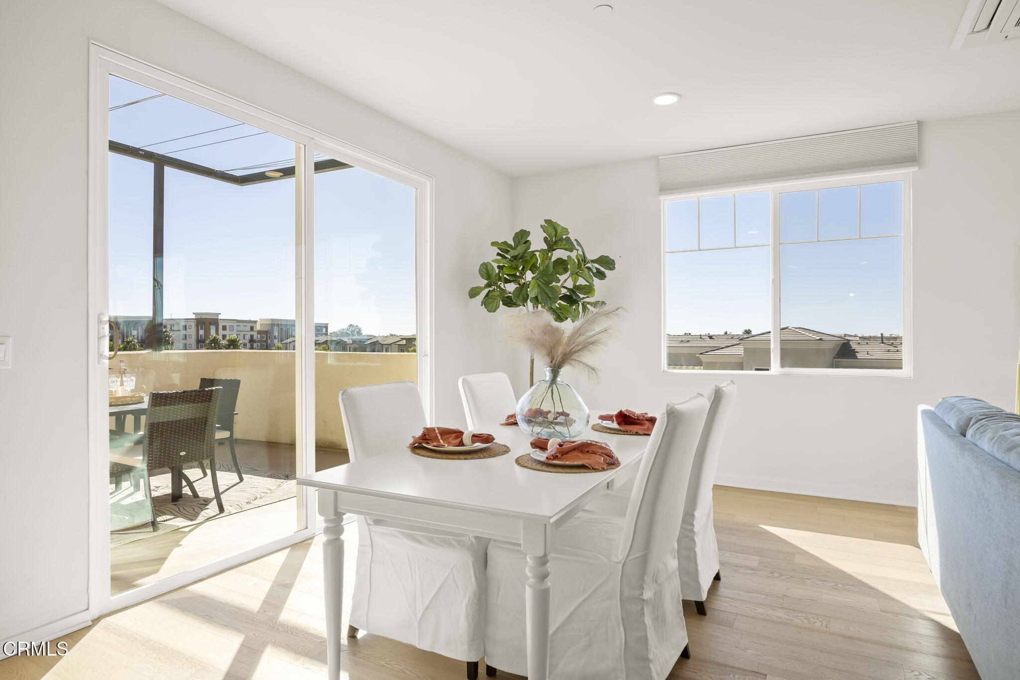 2800 Wagon Wheel Road, Unit 404 Oxnard, CA 93036 - Photo 9 of 43 a view of a dining room with furniture window and outside view
