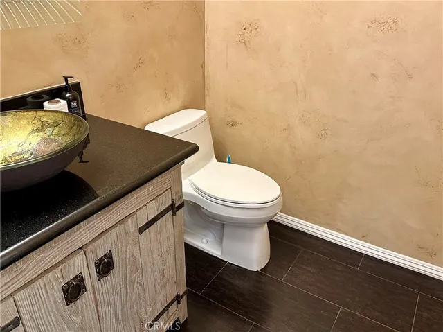 a bathroom with a sink and a toilet