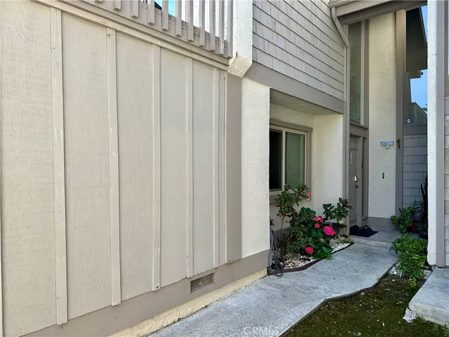 a view of a room with a lot of flower plants