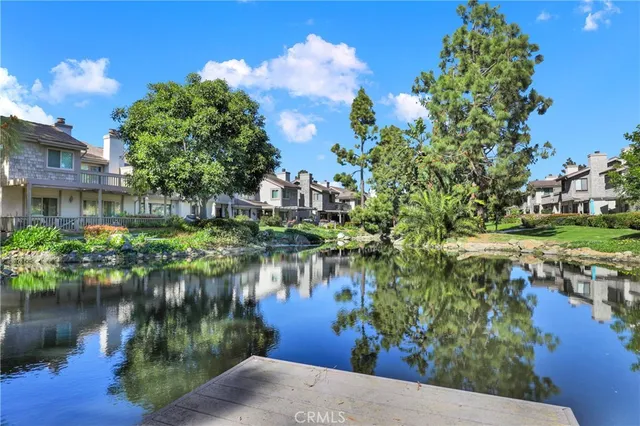 a view of a lake with a building in the background