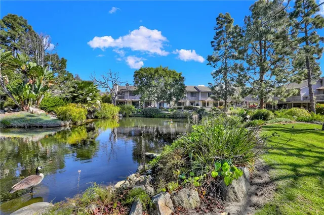 a view of a lake with a building in front of it