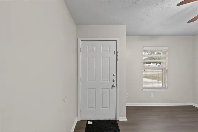 an empty room with windows