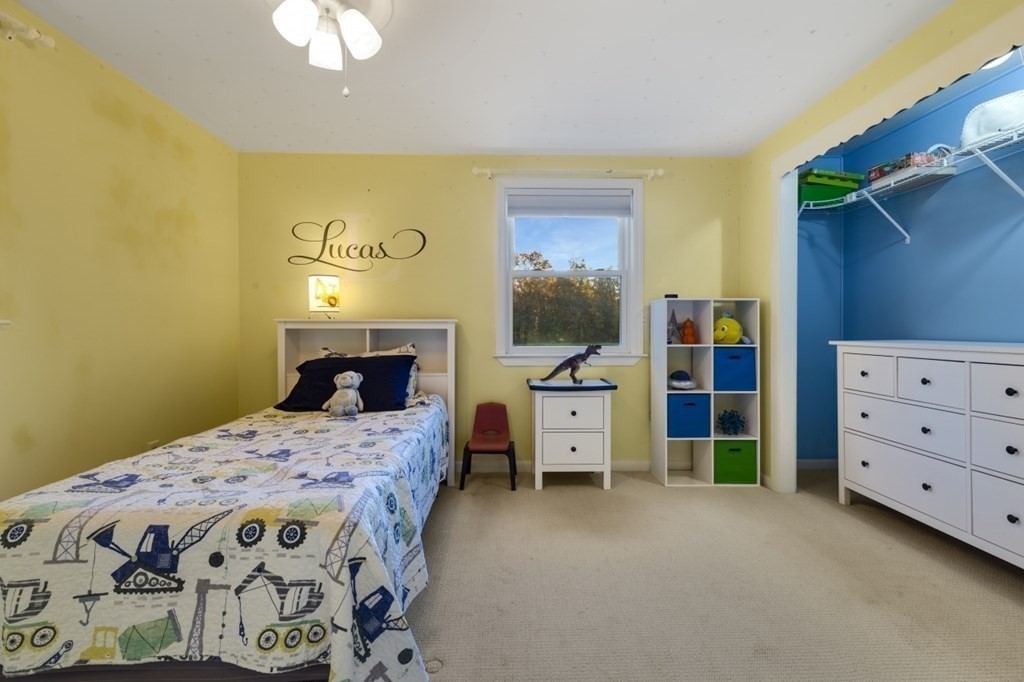 224 Lancaster Road Berlin, MA 01503 - Photo 13 of 32 a bedroom with a bed and a dresser