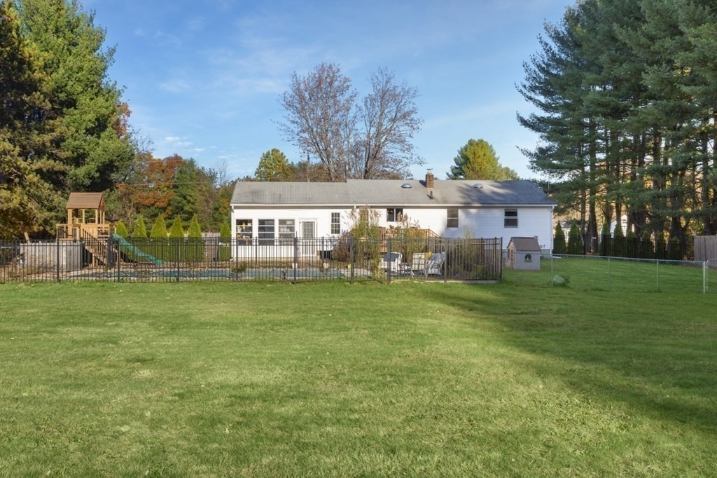 224 Lancaster Road Berlin, MA 01503 - Photo 27 of 32 a front view of a house with a garden