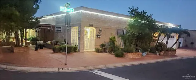 a view of a building with sitting area