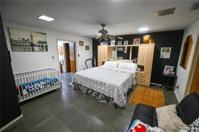a view of kitchen with sink window and refrigerator