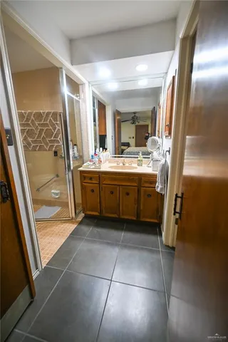 a bed room with a bed and a window