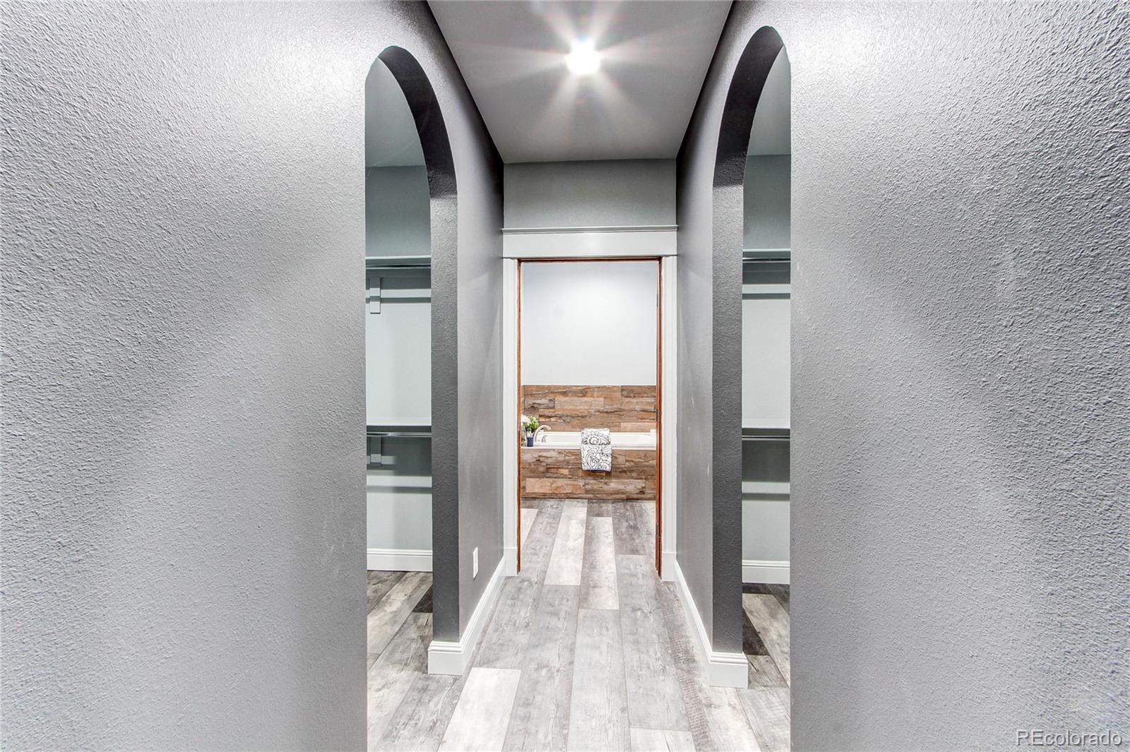 6001 Xmore Road Byers, CO 80103 - Photo 12 of 48 view of a living room with a fireplace