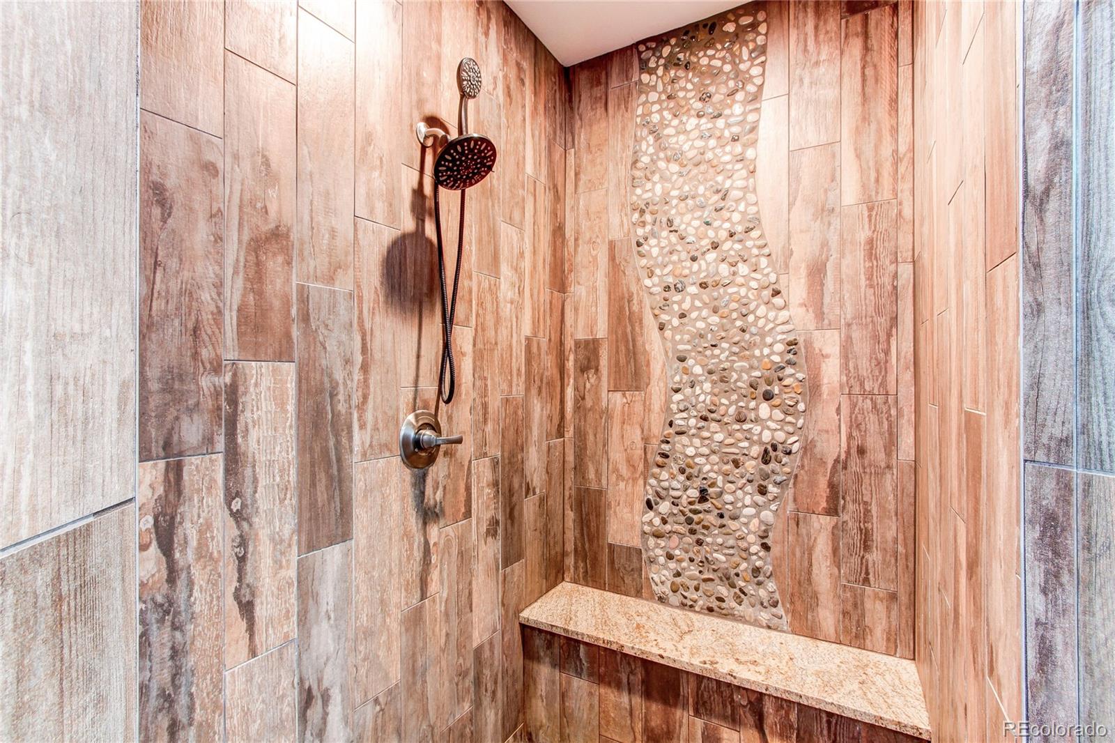 6001 Xmore Road Byers, CO 80103 - Photo 17 of 48 a bathroom with a shower