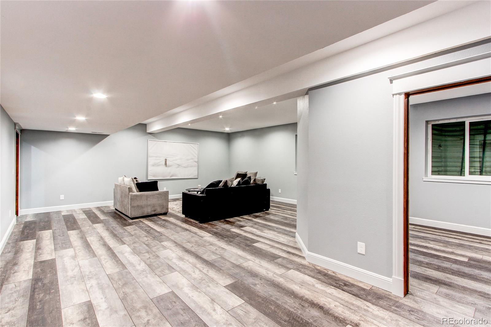 6001 Xmore Road Byers, CO 80103 - Photo 19 of 48 a bed room with a bed and a window