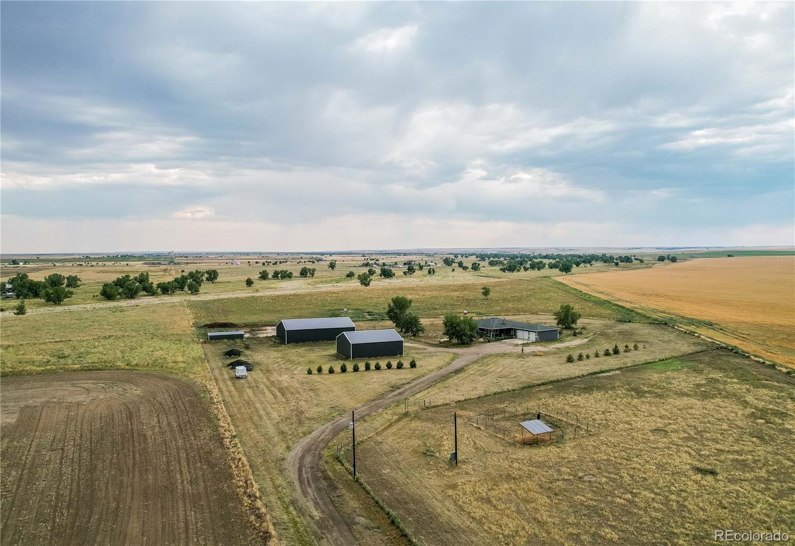 6001 Xmore Road Byers, CO 80103 - Photo 26 of 48 a view of an ocean with city view