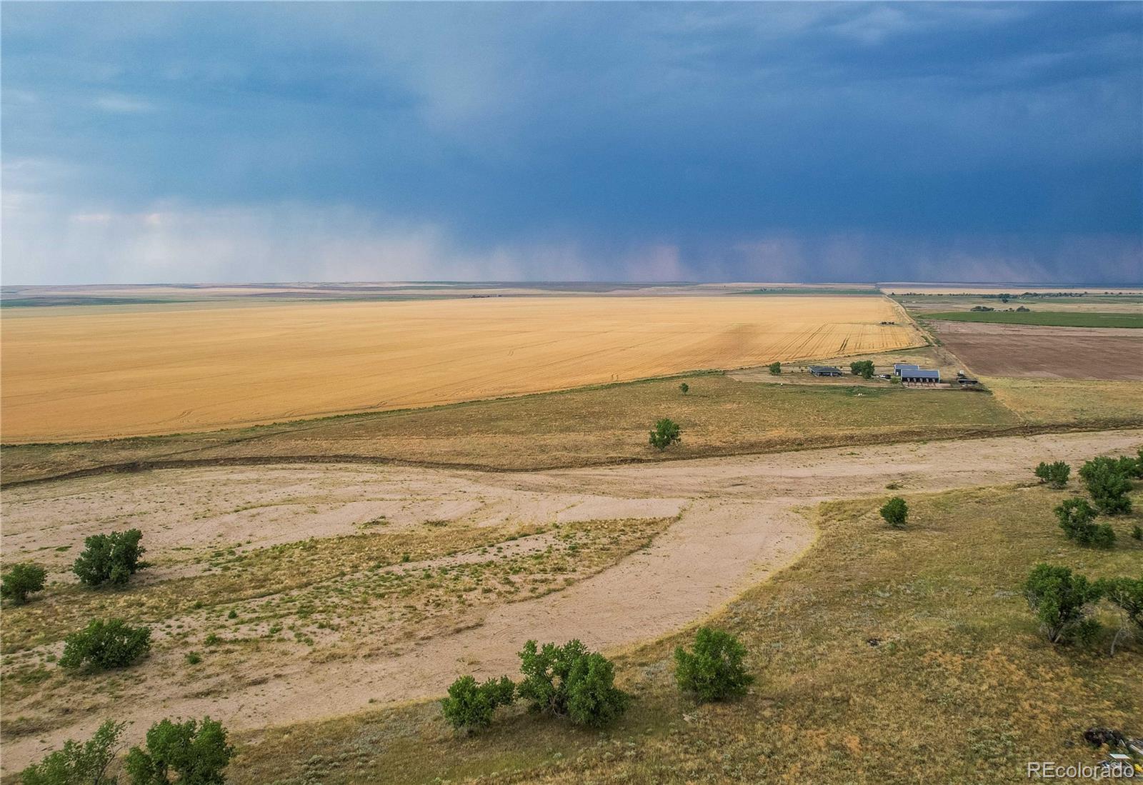 6001 Xmore Road Byers, CO 80103 - Photo 27 of 48 a view of beach and ocean
