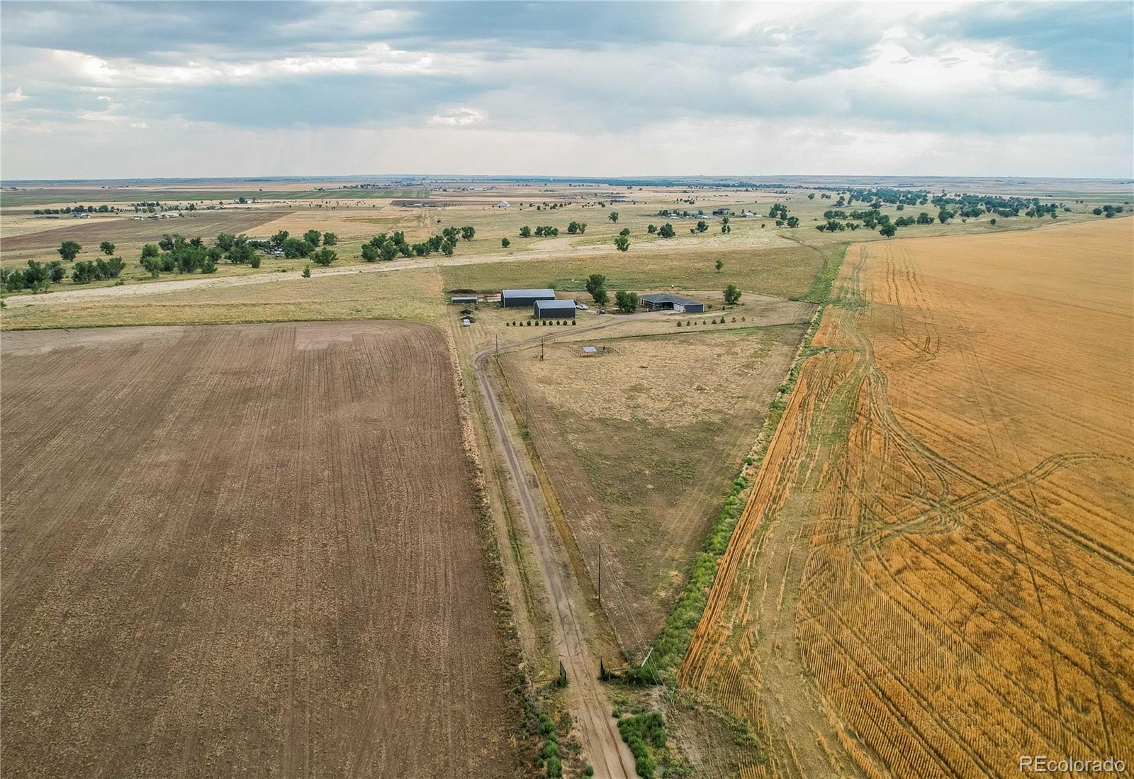6001 Xmore Road Byers, CO 80103 - Photo 30 of 48 a view of a lake view and mountain view