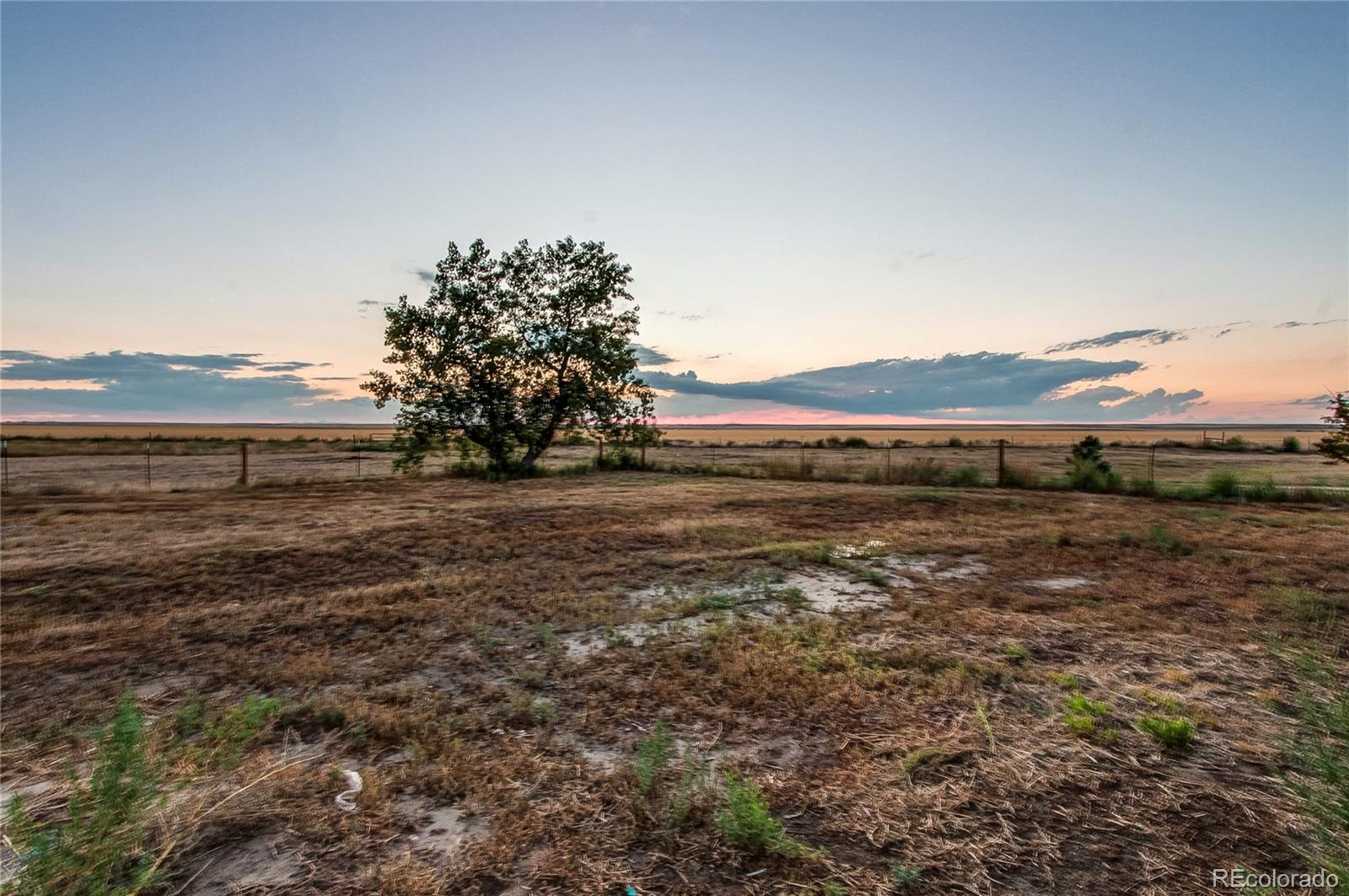 6001 Xmore Road Byers, CO 80103 - Photo 32 of 48 a view of outdoor space and mountain view