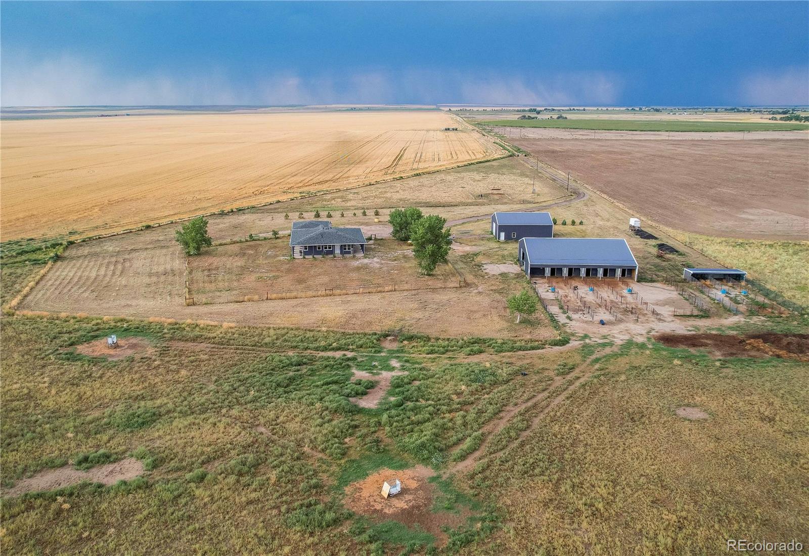 6001 Xmore Road Byers, CO 80103 - Photo 33 of 48 a view of an ocean and beach
