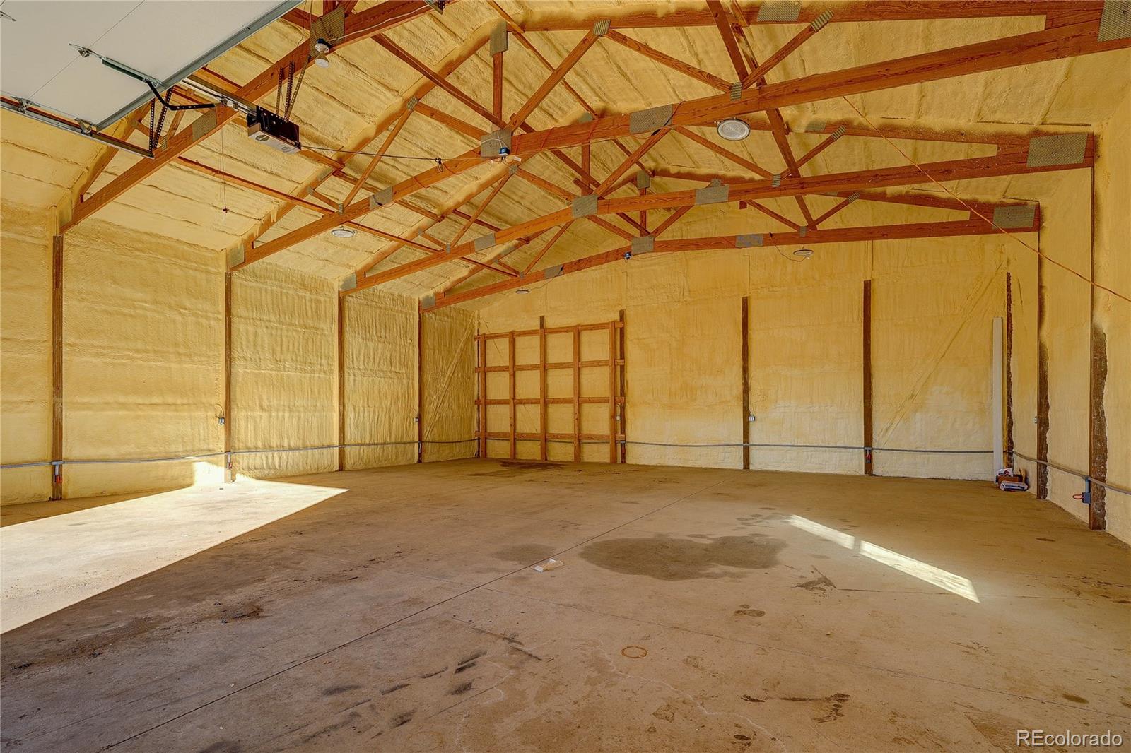 6001 Xmore Road Byers, CO 80103 - Photo 36 of 48 a view of an empty room with a window