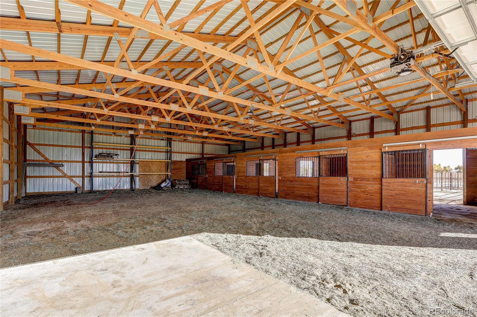 6001 Xmore Road Byers, CO 80103 - Photo 41 of 48 a big room with wooden roof