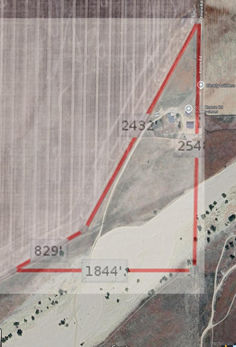 6001 Xmore Road Byers, CO 80103 - Photo 48 of 48 a view of a wooden door and a window