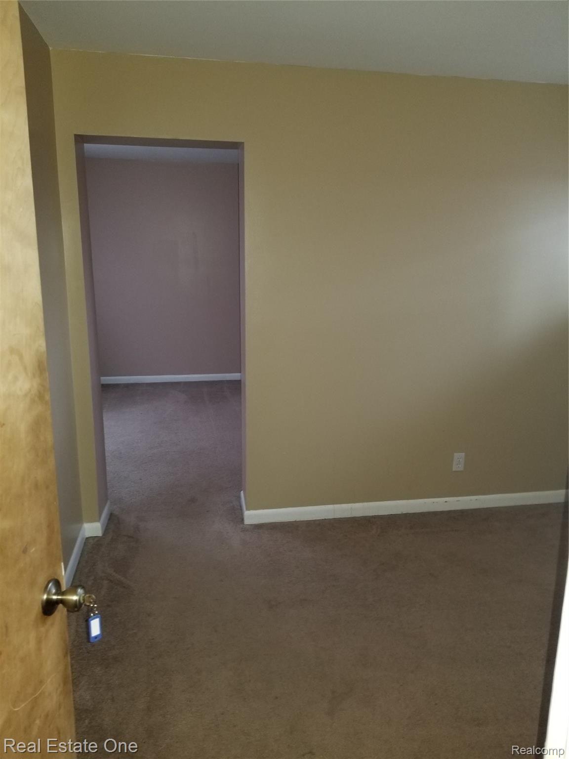 24601 Scotia Road Oak Park, MI 48237 - Photo 23 of 30 sitting rm into mstr bdrm.jpg