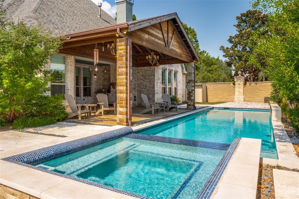 10482 Tobias Lane Frisco, TX 75033 - Photo 1 of 40 a view of a house with pool and sitting area