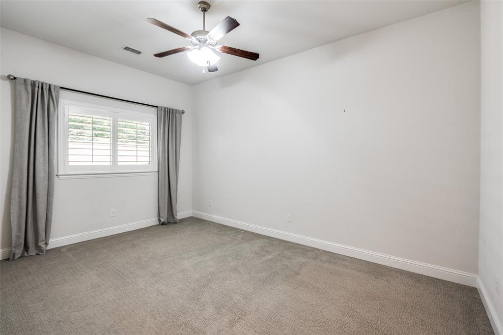 10482 Tobias Lane Frisco, TX 75033 - Photo 23 of 40 an empty room with a window and a fan