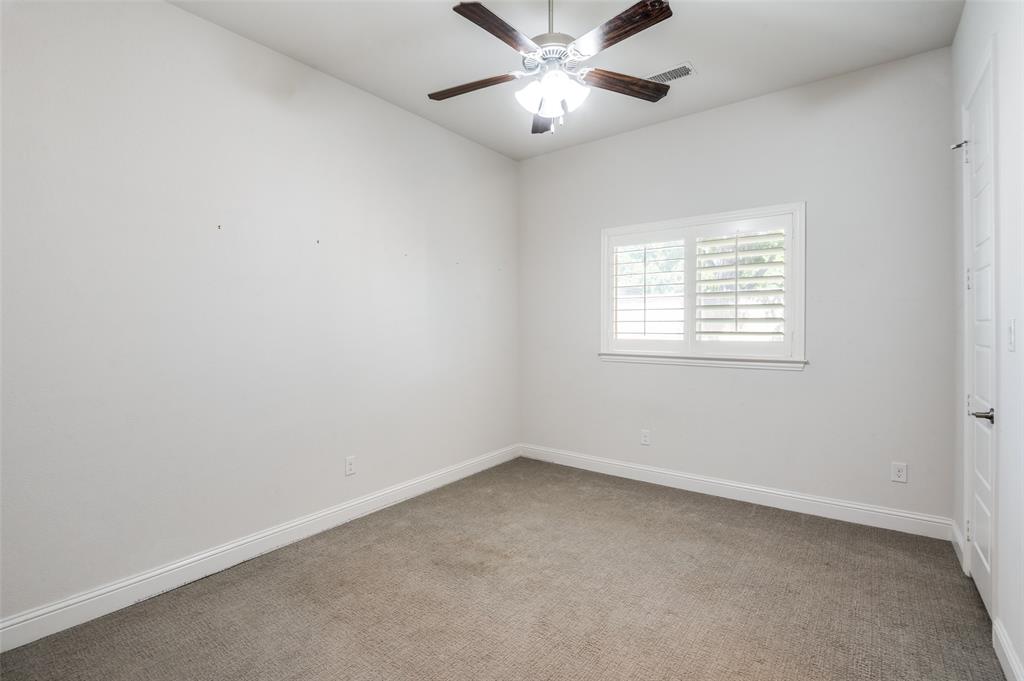 10482 Tobias Lane Frisco, TX 75033 - Photo 25 of 40 an empty room with a window and a fan