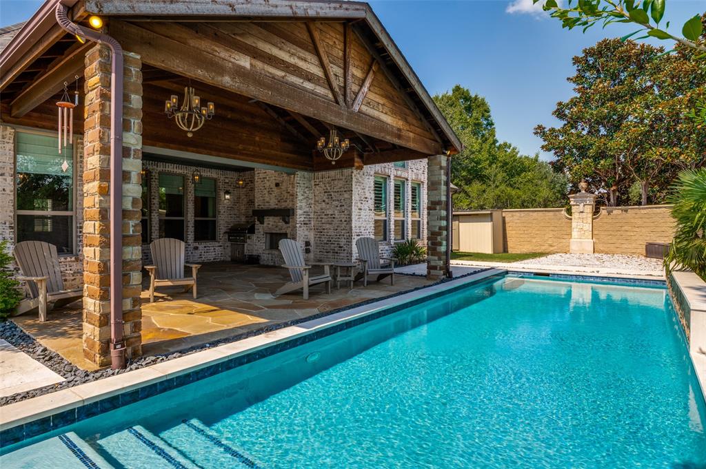 10482 Tobias Lane Frisco, TX 75033 - Photo 35 of 40 a view of a backyard with a patio