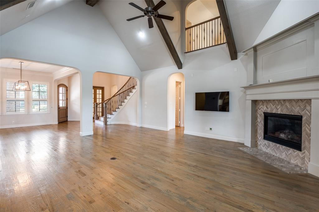 10482 Tobias Lane Frisco, TX 75033 - Photo 10 of 40 a view of entryway and hall with wooden floor