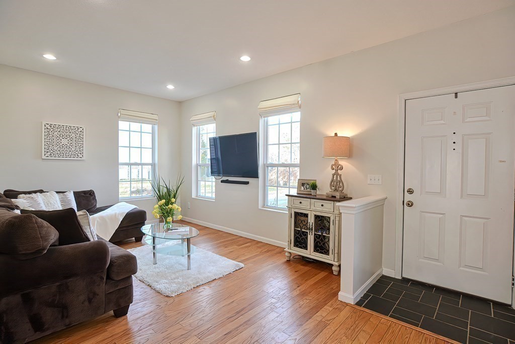 14 Robbins Road Foxboro, MA 02035 - Photo 15 of 42 a living room with furniture window and wooden floor