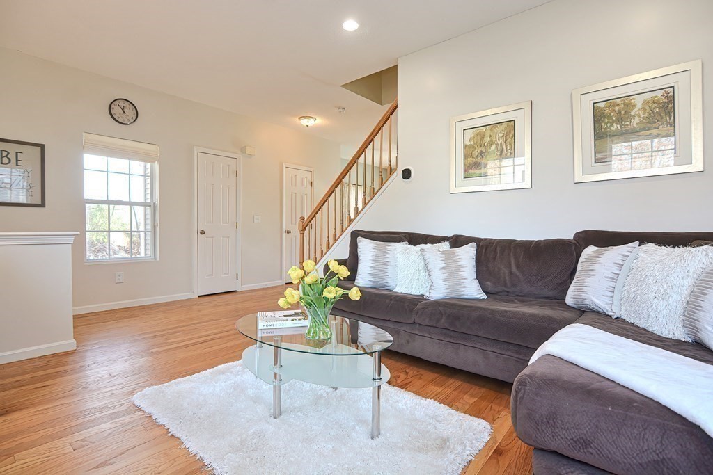 14 Robbins Road Foxboro, MA 02035 - Photo 17 of 42 a living room with furniture and wooden floor