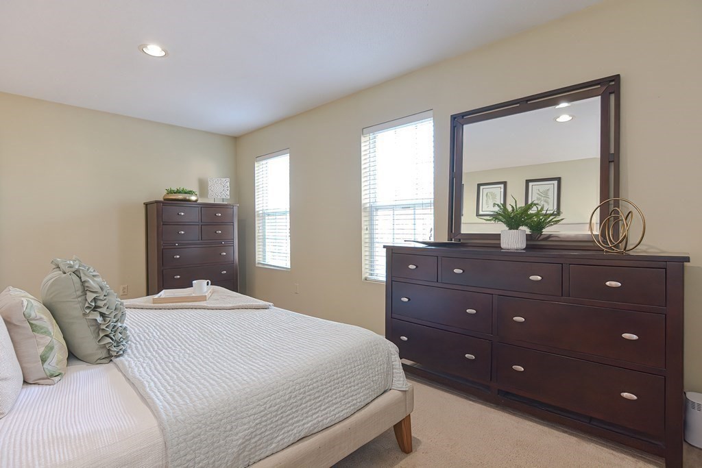 14 Robbins Road Foxboro, MA 02035 - Photo 23 of 42 a bedroom with a bed and a dresser