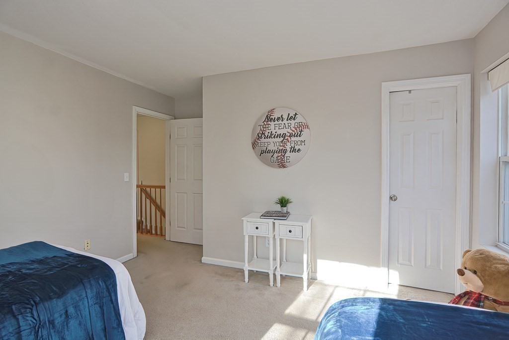 14 Robbins Road Foxboro, MA 02035 - Photo 26 of 42 a view of room with furniture and wooden floor