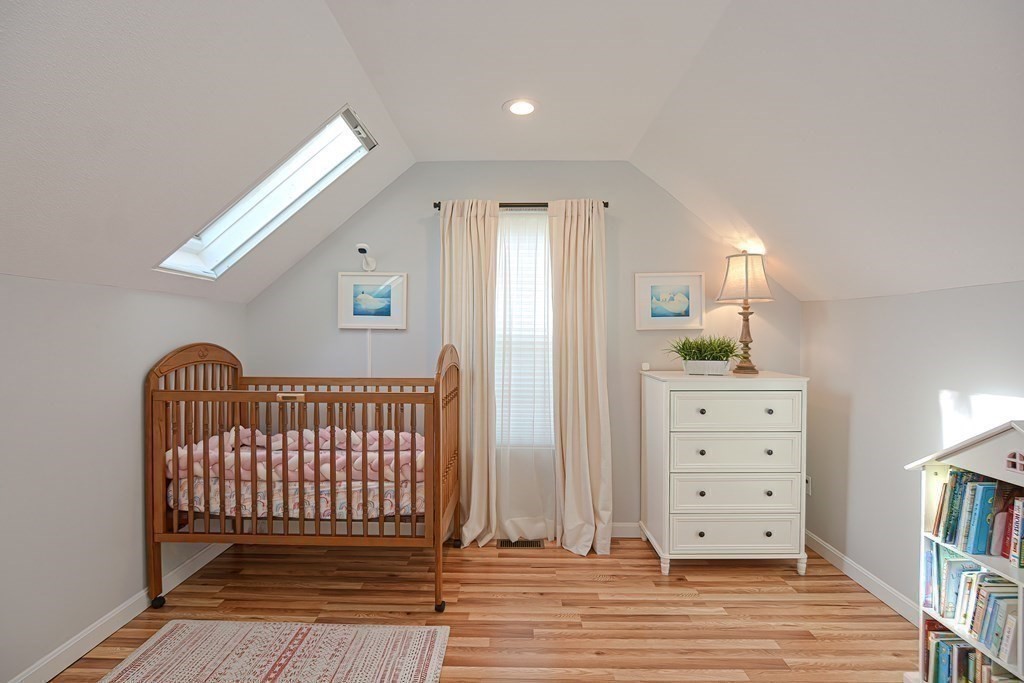 14 Robbins Road Foxboro, MA 02035 - Photo 27 of 42 a view of a hallway with closet and cabinet