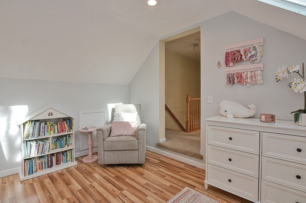 14 Robbins Road Foxboro, MA 02035 - Photo 29 of 42 a bedroom with furniture and a book shelf
