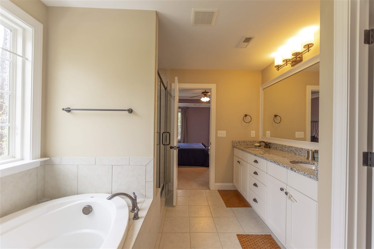 7203 Holly Springs Road Raleigh, NC 27606 - Photo 9 of 25 Master Spa Bathroom