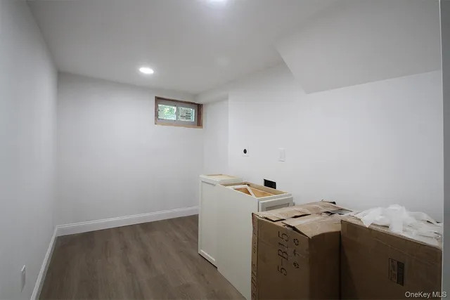 a view of storage and utility room with washer and dryer