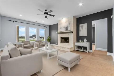 a view of an empty room with a fireplace
