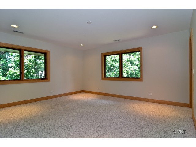 115 Dickens Road Northfield, IL 60093 - Photo 14 of 25 an empty room with windows