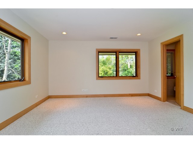 115 Dickens Road Northfield, IL 60093 - Photo 15 of 25 an empty room with windows