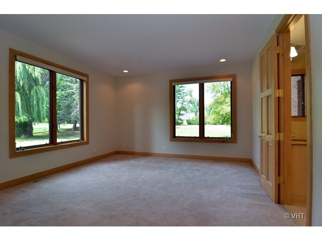 115 Dickens Road Northfield, IL 60093 - Photo 18 of 25 a view of an empty room with a window