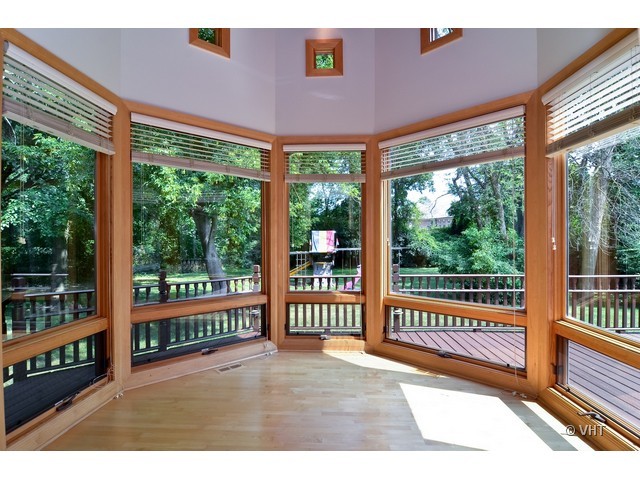 115 Dickens Road Northfield, IL 60093 - Photo 7 of 25 a view of a balcony with floor to ceiling windows