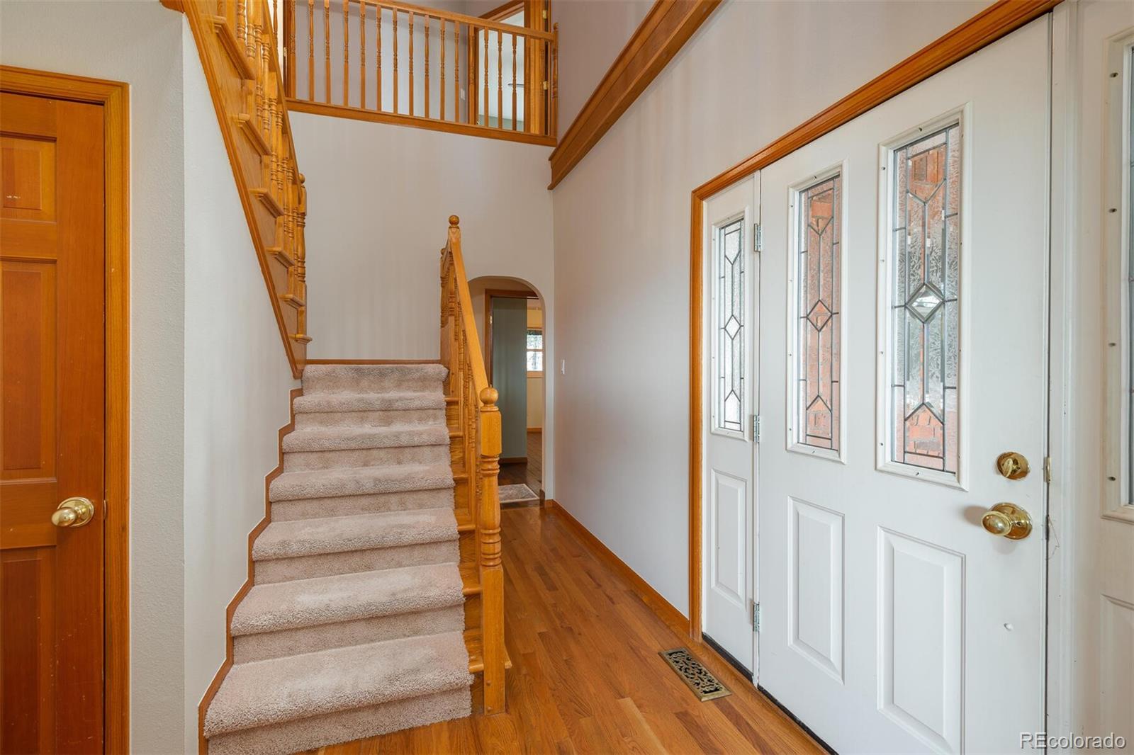 9905 Isabelle Road Lafayette, CO 80026 - Photo 16 of 38 a view of an entryway with staircase