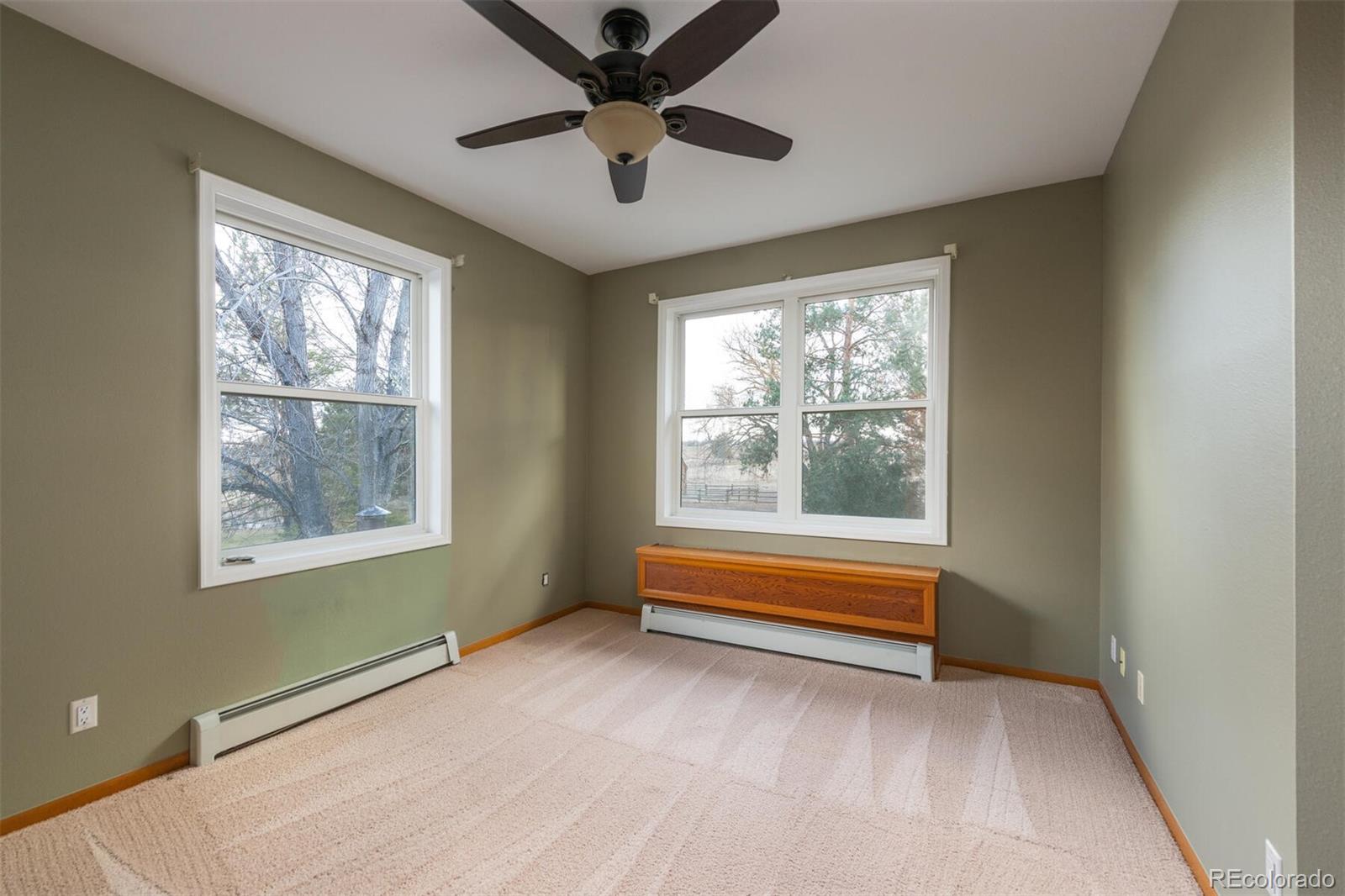 9905 Isabelle Road Lafayette, CO 80026 - Photo 36 of 38 a view of room with window and ceiling fan