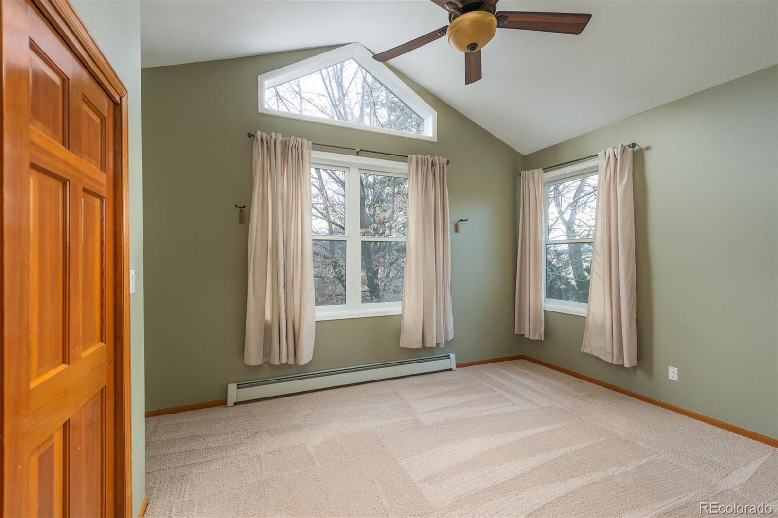 9905 Isabelle Road Lafayette, CO 80026 - Photo 37 of 38 a view of an empty room with a window